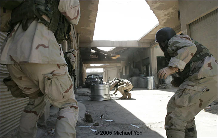 Three bullets reach flesh: One snaps his thigh bone in half.