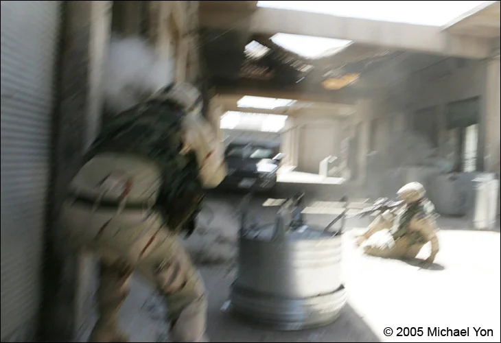 The Commander rolls into a firing position, just as a bullet strikes the wall beside 2nd lieutenant’s head (left).