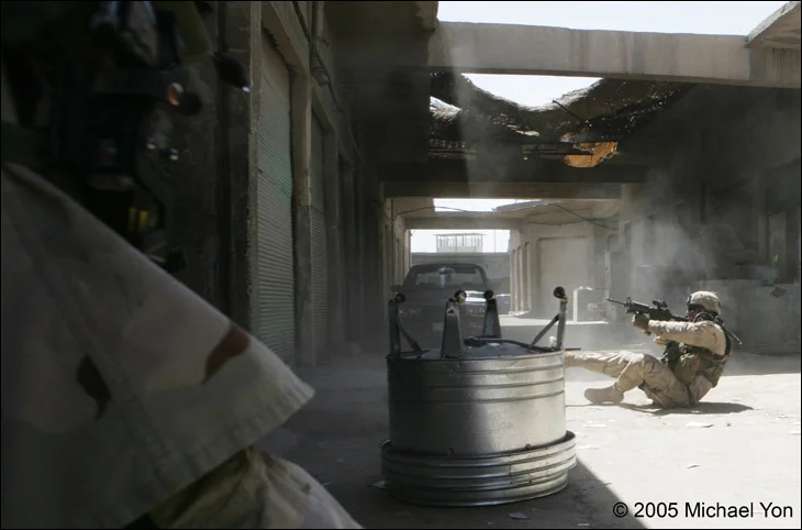 …and fights, as more bullets kick up dust.