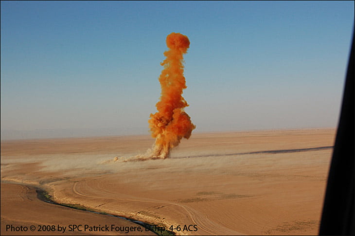 The shockwave pops up the desert dust. The pilot reached up to prepare to restart the engines in case the shockwave disrupted the airflow. The engines kept running.