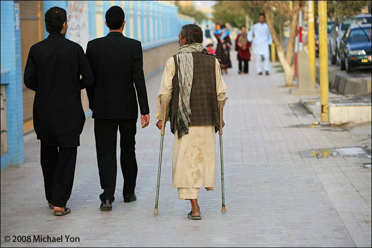Man begging outside the Blue Mosque in Mazar i Sharif, Afghanistan