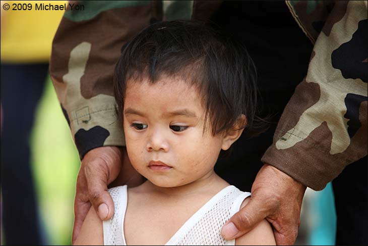 Photo of the day: The Moro Commander, Benjie Luscadato, introduces this baby to the Americans.
