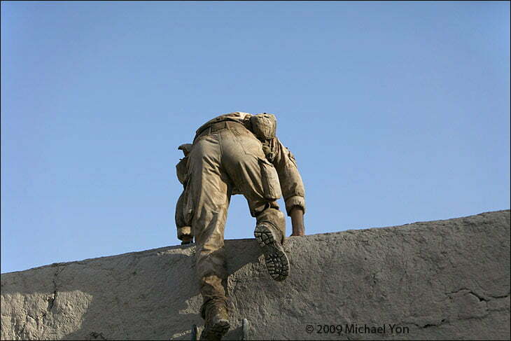 As the sun rose higher, the soldiers stuck it out on the sweltering roof.  Many of these soldiers have been to Iraq, and it was much hotter in Basra, but still the temperature would climb to about 110 degrees in the sun.  They were chugging the water but without complaints.