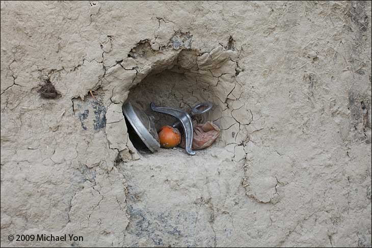 The only cupboards were simple recesses in the mud walls.