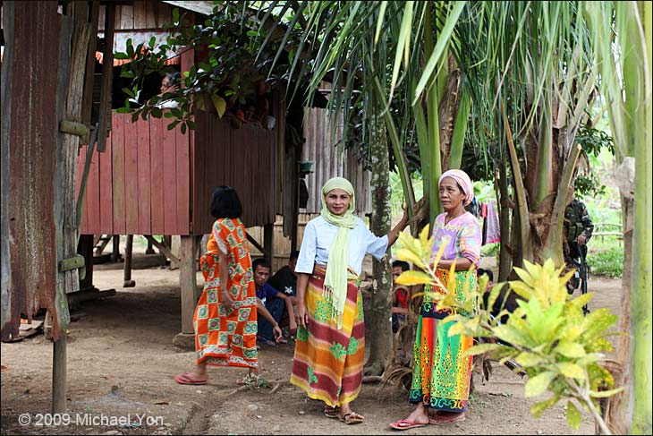 Mindanao.  Most of these Moro women were happy to have their photos taken, and only a few were shy, but even when they were shy they laughed.  The men of this village had fought for decades and only surrendered with dignity on 20 April 2009.