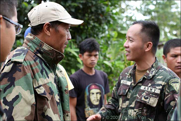 Numerous AFP soldiers extended a hand to the Guerrilla commander and he took each hand with what appeared to be a genuine smile.
