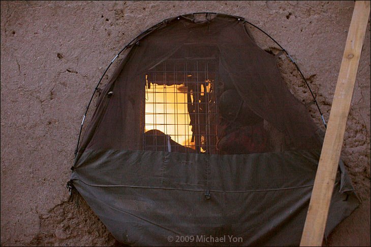 Patrol Base Tangiers is situated in ramshackle accommodations in a bombed-out compound.  ANA use a British 'Mozzie net' as a window.