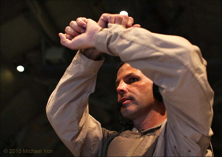 After a patient is loaded, Tom Parsons gives the signal that they’re ready for the next.