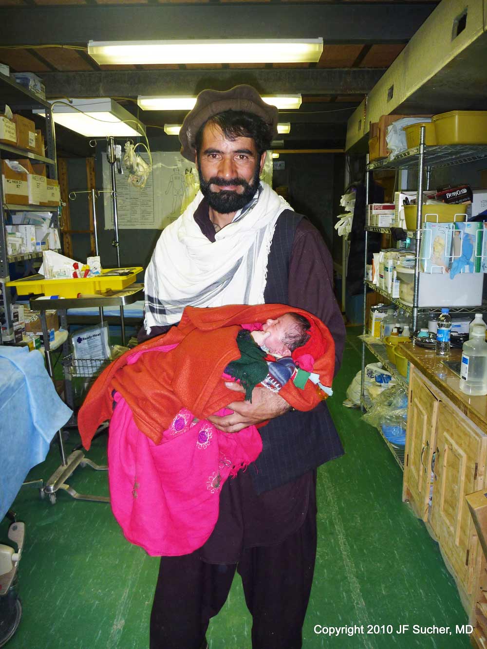 Orgune father with baby girl - Paktika Province, Afghanistan 2010.