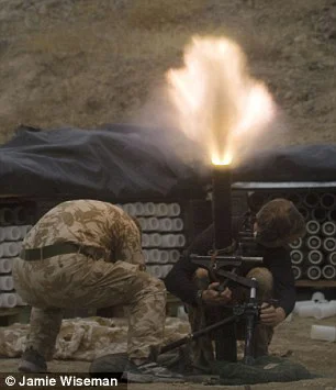 Constant threat: British mortarmen fire at Taliban forces in Helmand