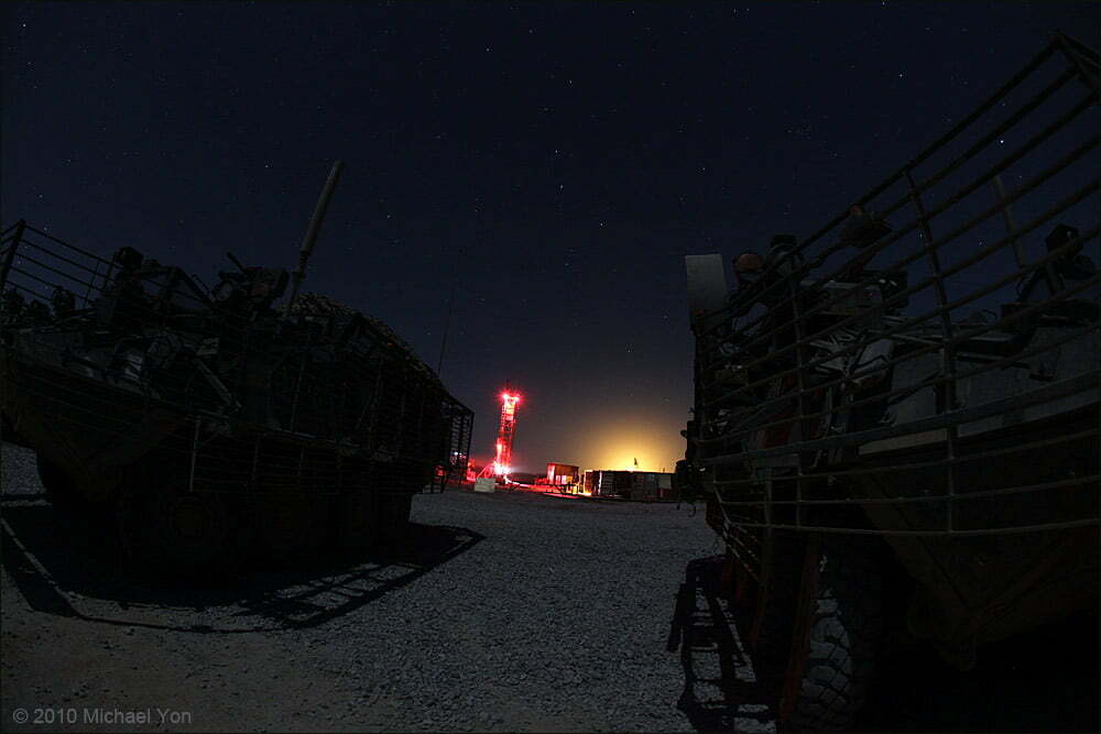 A thirty-second walk from my bunk, these Strykers were parked waiting for a mission.  While RED HORSE works on the lighted rig, the orange glow in the background is from parachute illumination near the Afghan Police at Dala Dam.  A couple weeks ago, the Afghan National Police got attacked there.  The enemy fired at the police and baited the ANP to chase.  When the ANP raced off, their truck was hit with a bomb, killing two ANP.  And so each night, our guys have been firing nightlights for the ANP.