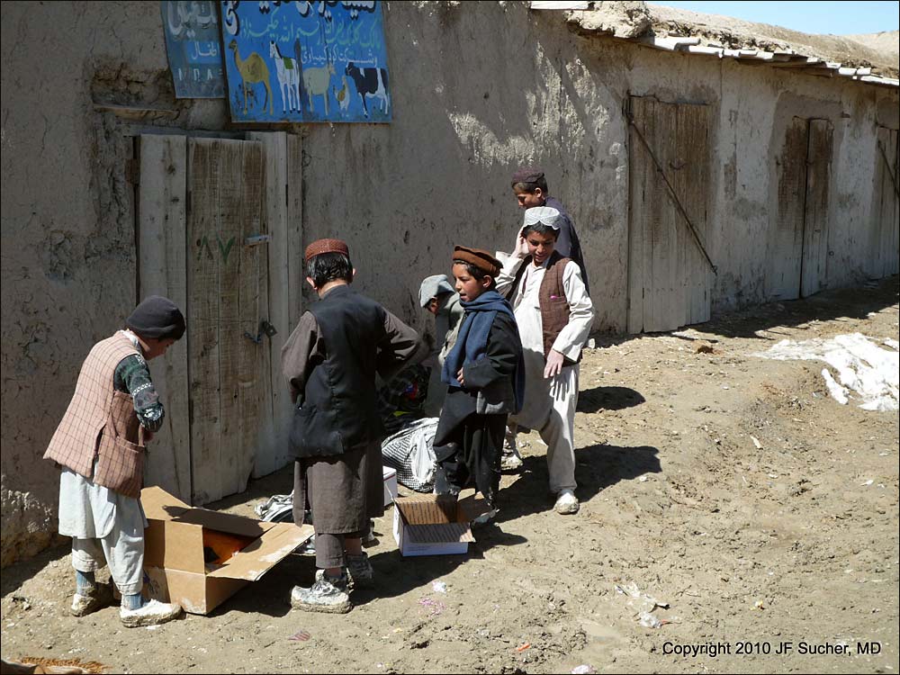 Village boys with the school supplies and clothing - Logar Province, Afghanistan *