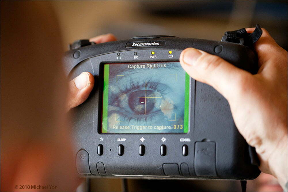 After the photo comes the retina scan.