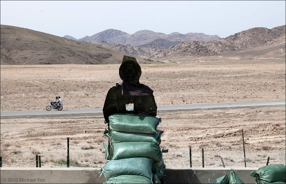 This guy wasn't dead—just playing decoy.  While I was with British 2 Para in Helmand—excellent fighters—the snipers 'confiscated' two sex dolls from a Belgian soldier, then dressed the dolls in uniforms and put them up to try to draw sniper fire.  (We were taking a lot of sniper fire.)