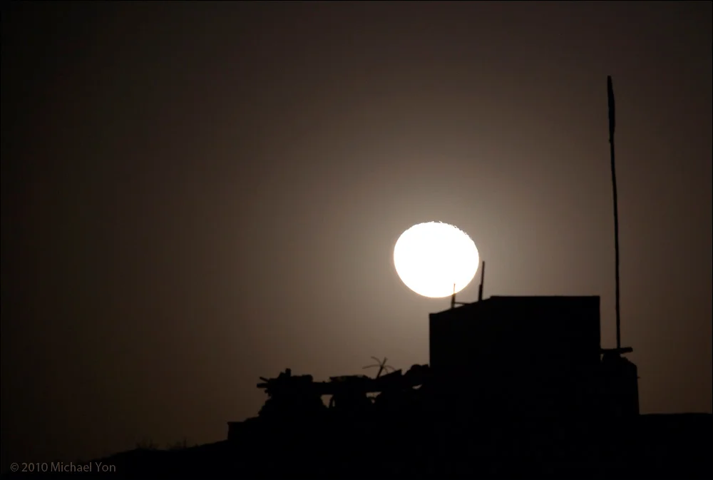 Rising moon: observation post just outside the Shah Wali Kot district center.